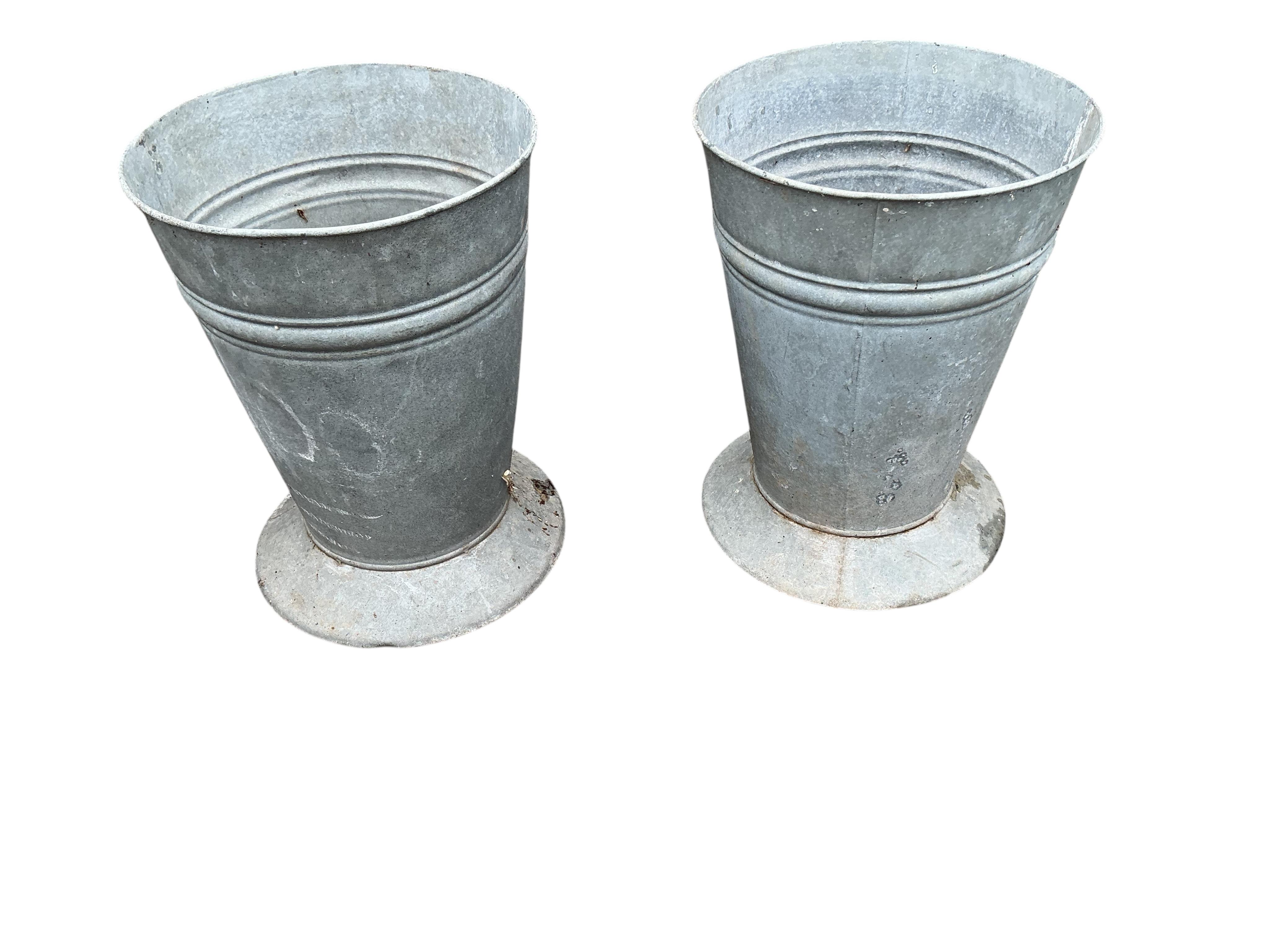 A pair of galvanised florist's flower buckets, diameter 29cm, height 38cm
